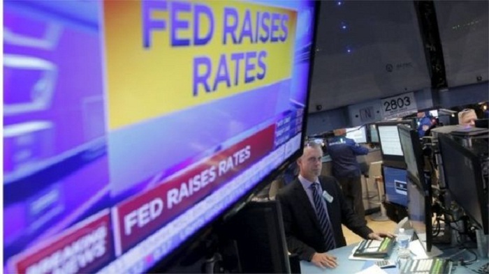 Federal Reserve, buoyed by stronger economy, lifts rates again